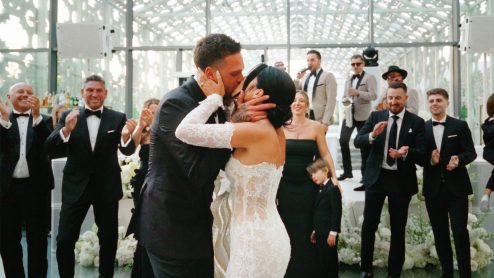 Wedding Films 5 Couple kiss in the new fort hall at their hotel x wedding in toronto